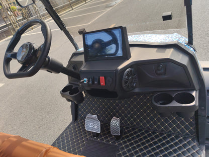 smart golf cart interior with steering wheel and LED dashboard view